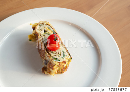 Vegetarian omelet on a plate Vegetarian omelet on a plate 77853677