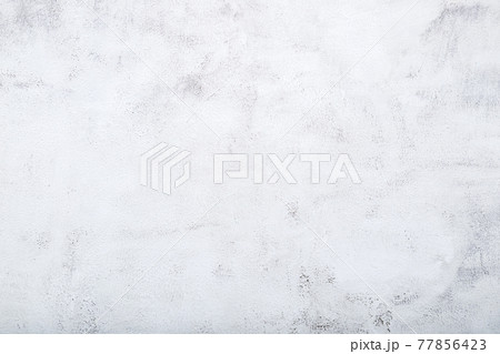 Background of old aged rough white painted concrete with stains texture .Vintage white concrete background top view. Background of old aged rough white painted concrete with stains texture .Vintage white concrete background top view. 77856423