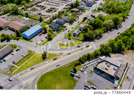Panoramic view of a neighborhood in roofs of houses of residential area and comercial quarters Sayreville town in New Jersey USA Panoramic view of a neighborhood in roofs of houses of residential area and comercial quarters Sayreville town in New Jersey USA 77860449