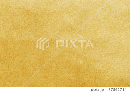 Gold velvet background or golden yellow velour flannel texture made of cotton or wool with soft fluffy velvety satin fabric cloth metallic color material 77862714