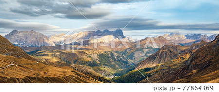 Autumn alpine Dolomites mountain scene near Pordoi Pass, Trentino , Italy. Autumn alpine Dolomites mountain scene near Pordoi Pass, Trentino , Italy. 77864369