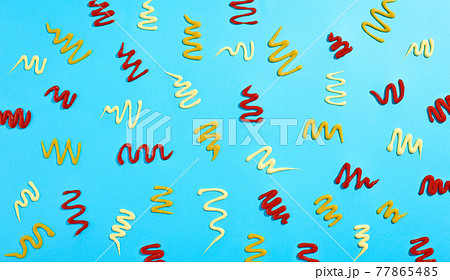 Ketchup mayonnaise and mustard pattern on light blue background Ketchup mayonnaise and mustard pattern on light blue background 77865485