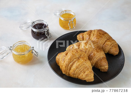 Free Photo  French breakfast with croissants, apricot jam, cherry