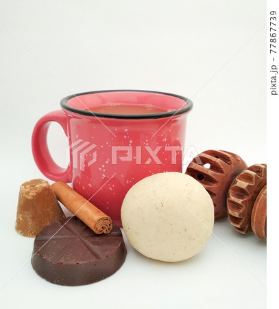 Atole Champurrado is a typical Mexican made with corn dough, dark chocolate and cinnamon, piloncillo. 77867739