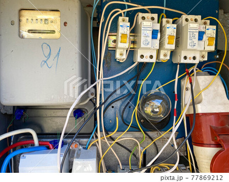 Homemade electric control cabinet for electronic devices at home with circuit breakers and counters in an iron box 77869212