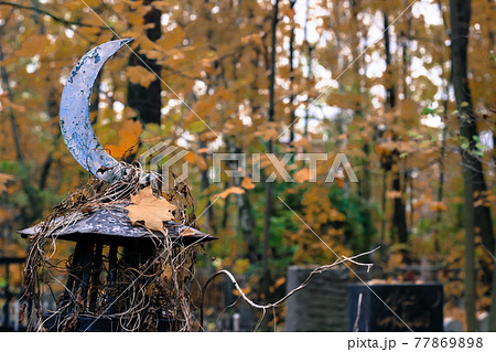 Old islamic cemetery, funeral and burial of muslim. A grave with iron crescent moon. Metal gravestone 77869898