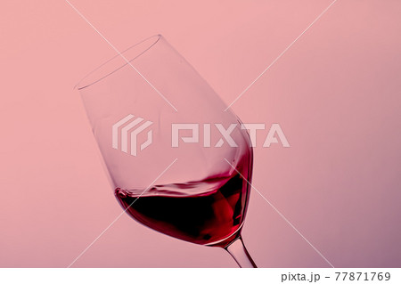 Red wine in crystal glass, alcohol drink and luxury aperitif, oenology and viticulture product Red wine in crystal glass, alcohol drink and luxury aperitif, oenology and viticulture product 77871769