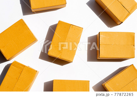 Brown cardboard boxes on white background. Brown cardboard boxes on white background. 77872265
