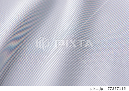 Closeup of rippled white silk fabric, white fabric texture background, 77877116