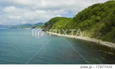 Drone view of rocks, nature, sea and water - Skala Kiseleva is a natural monument on the territory of the Tuapse district of the Krasnodar Territory. Aerial view from above. 4K footage. Drone view of rocks, nature, sea and water - Skala Kiseleva is a natural monument on the territory of the Tuapse district of the Krasnodar Territory. Aerial view from above. 4K footage. 77877420