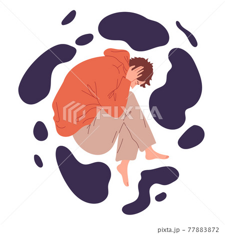 Young man lies curled up with painful emotions 77883872