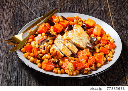 Salad of chickpea, butternut on a plate, top view Salad of chickpea, butternut on a plate, top view 77885638