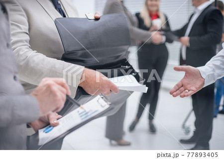 close up. business partners discussing financial schedule close up. business partners discussing financial schedule 77893405