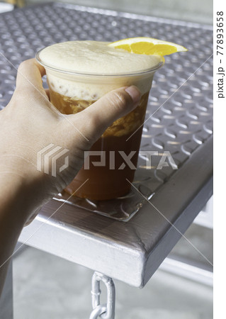Orange juice and espresso or black tea with orange Orange juice and espresso or black tea with orange 77893658