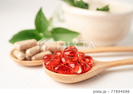Alternative medicine herbal organic capsule with vitamin E omega 3 fish oil, mineral, drug with herbs leaf natural supplements for healthy good life. 77894086
