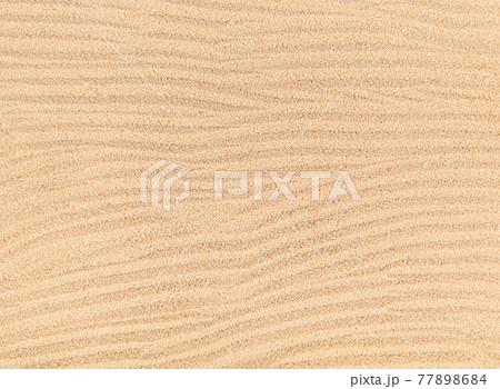 Sand waves texture background, beach top view. 77898684