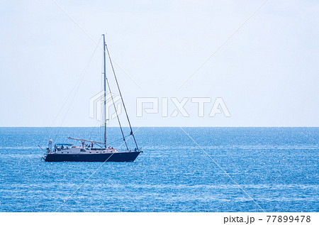 Sailing yacht in the blue calm sea. 77899478