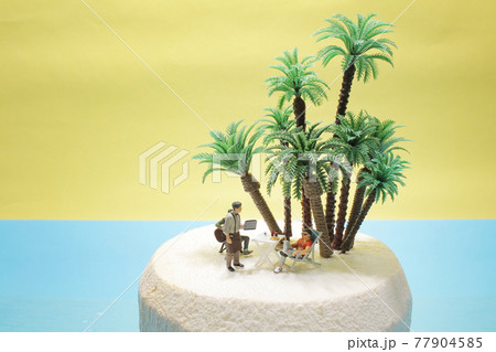 a Mini Tourist sitting in a deck chair on Young coconut 77904585