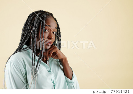 Shy attractive young woman Shy attractive young woman 77911421