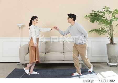 newly married Asian couple at home 77911902