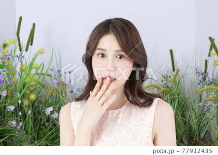 Beautiful Asian model in pink mini dress, spring fashion and beauty concept Beautiful Asian model in pink mini dress, spring fashion and beauty concept 77912435