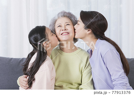 three generations of women, Asian grandmother, mother and grand daughter three generations of women, Asian grandmother, mother and grand daughter 77913376