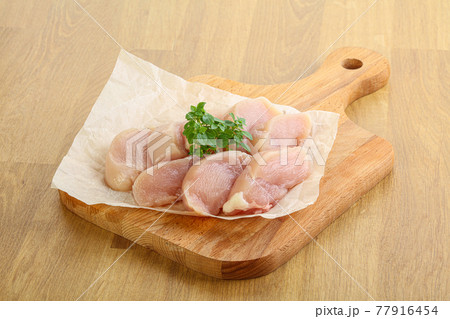 Raw chicken breast slices for cooking Raw chicken breast slices for cooking 77916454