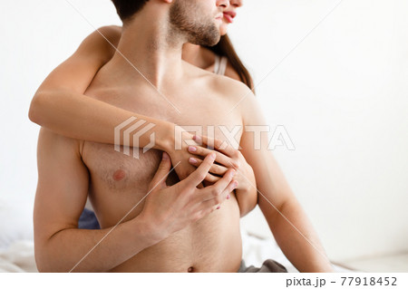 Unrecognizable Woman Touching Naked Male Torso During Foreplay In Bedroom Unrecognizable Woman Touching Naked Male Torso During Foreplay In Bedroom 77918452