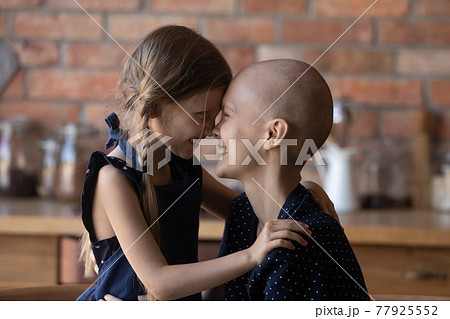 Happy mom with cancer and positive little daughter girl 77925552