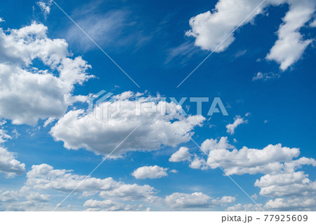 Clouds on the blue sky. 77925609