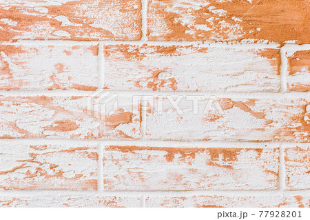 Light white brick wall with orange decorative paint patterns texture background 77928201