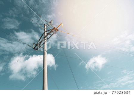 High voltage tower with electricity transmission power lines High voltage tower with electricity transmission power lines 77928634