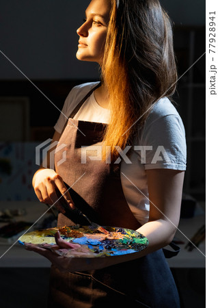 inspired female artist enjoying painting creative 77928941