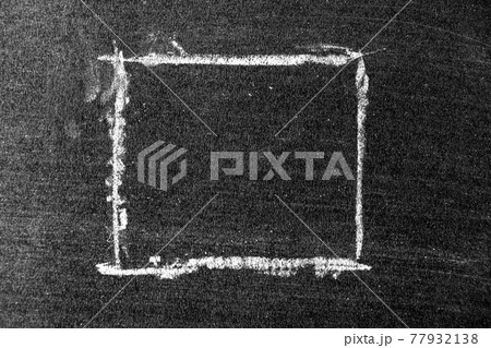 White chalk hand drawing in square or banner shape on black board background White chalk hand drawing in square or banner shape on black board background 77932138