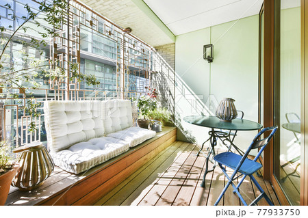 Balcony with cushions and table Balcony with cushions and table 77933750