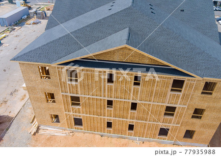 Wood building frame structure on a new development 77935988