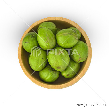 Top view of Chebulic Myrobalans, Myrolan Wood (Terminalia chebula Retz.) Fruit, medicinal properties. on white background 77940934