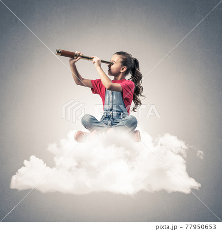 Concept of careless happy childhood with girl dreaming about future 77950653