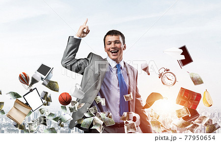 Businessman and falling from sky various goods Businessman and falling from sky various goods 77950654