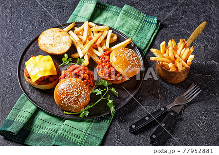 Sloppy Joe sandwiches with french Fries, top view Sloppy Joe sandwiches with french Fries, top view 77952881