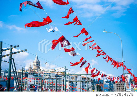 Flags of Turkey are hung over the streets of Istanbul. Political elections in Turkey 77954579