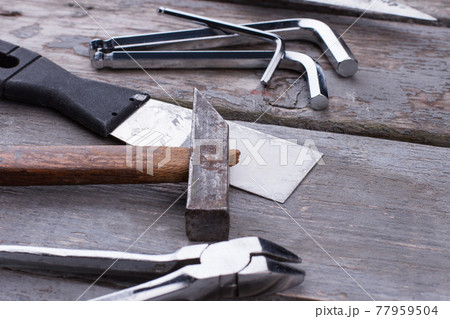 Hardware tools and instruments on wooden background. 77959504