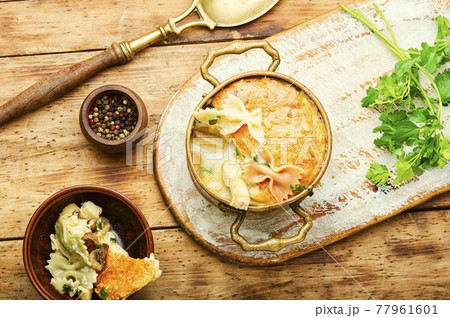 Delicious meat casserole with macaroni Delicious meat casserole with macaroni 77961601