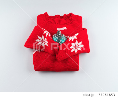 Red ugly christmas sweater with green ornament 77961853