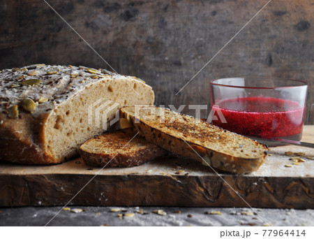 sliced bread with raspberry jam.Bread at leaven. Unleavened bread sliced bread with raspberry jam.Bread at leaven. Unleavened bread 77964414
