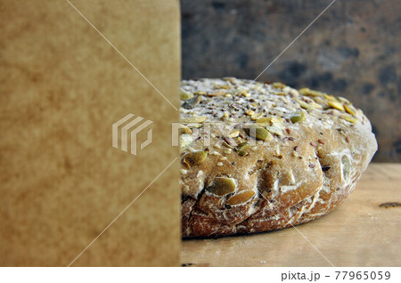 Bread and paper. 77965059