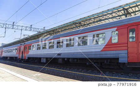 Train on Moscow passenger platform (Belorussky railway station) is one of the nine main railway stations in Moscow, Russia Train on Moscow passenger platform (Belorussky railway station) is one of the nine main railway stations in Moscow, Russia 77971916