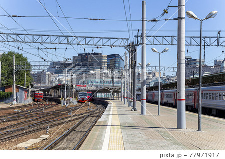 Train on Moscow passenger platform (Belorussky railway station) is one of the nine main railway stations in Moscow, Russia Train on Moscow passenger platform (Belorussky railway station) is one of the nine main railway stations in Moscow, Russia 77971917