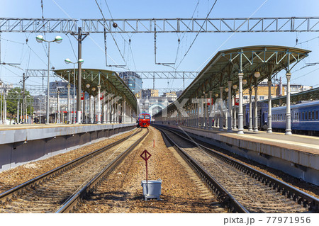 Train on Moscow passenger platform (Belorussky railway station) is one of the nine main railway stations in Moscow, Russia 77971956