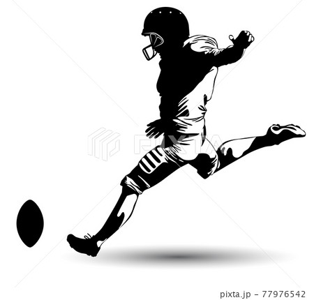 Black and white image of a football player kicking the ball Black and white image of a football player kicking the ball 77976542